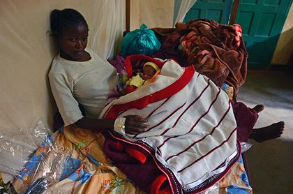 Mother with child after cesarean surgery (The child is not from a rape)